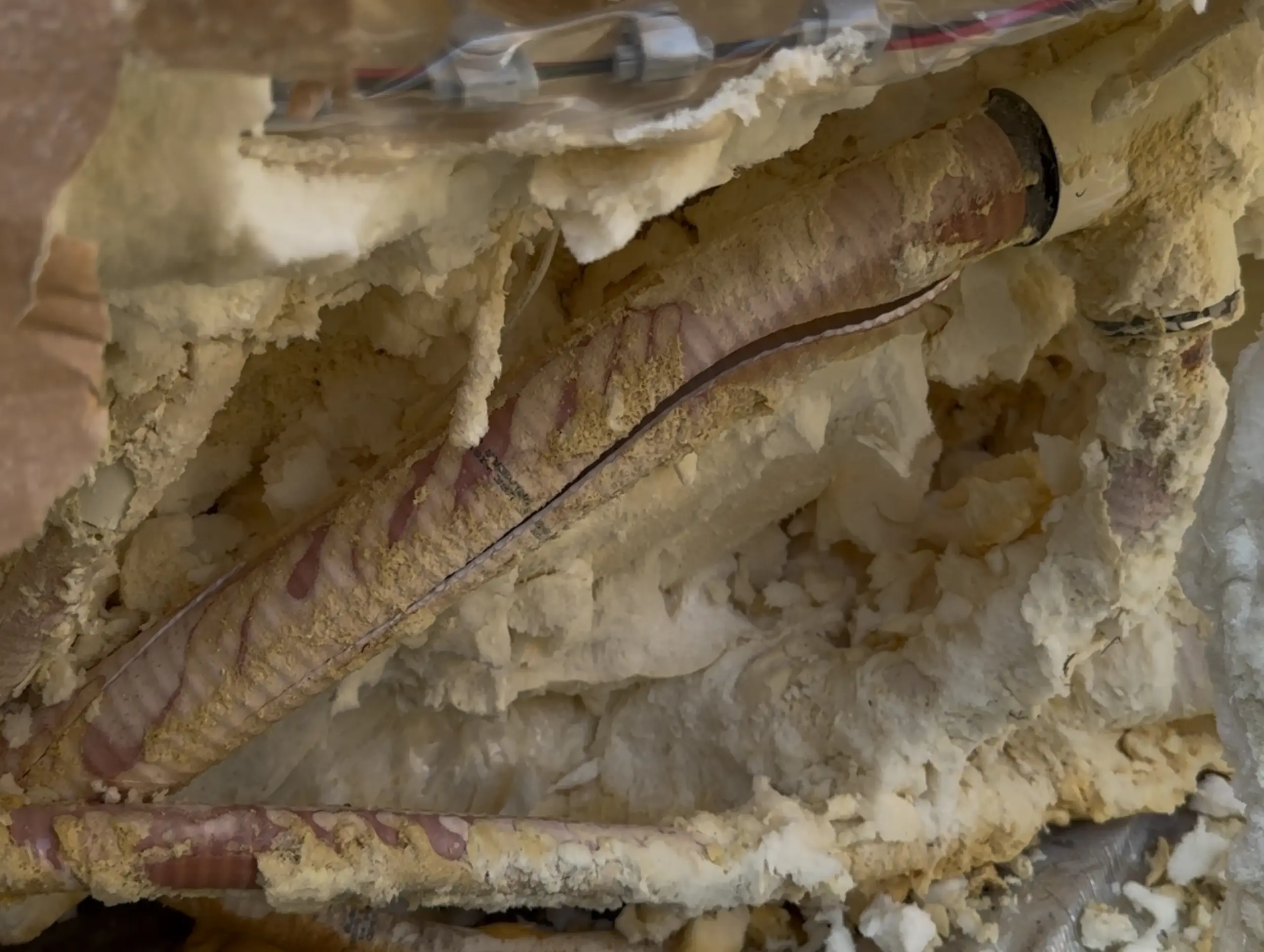 A cracked hot tub pipe